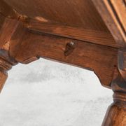 Brutalist coffee table in solid oak, metal, and patinated leather, 1940s.