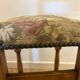 Antique chair with upholstered fabric seat