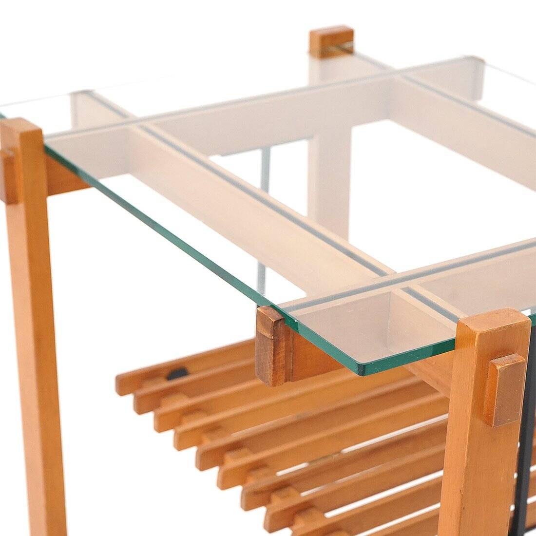 Wood and glass coffee table with wheels, 1960s.