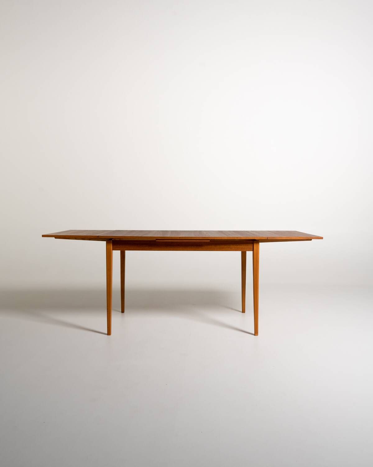 Scandinavian extendable teak and beech dining table, 1950s-60s