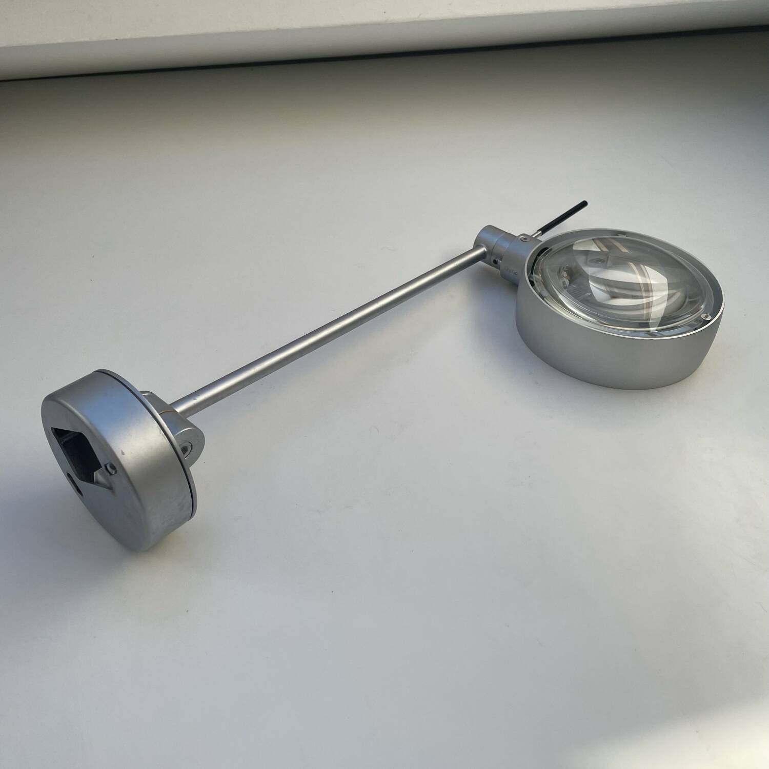 Wall lamp with arm Sento Occhio