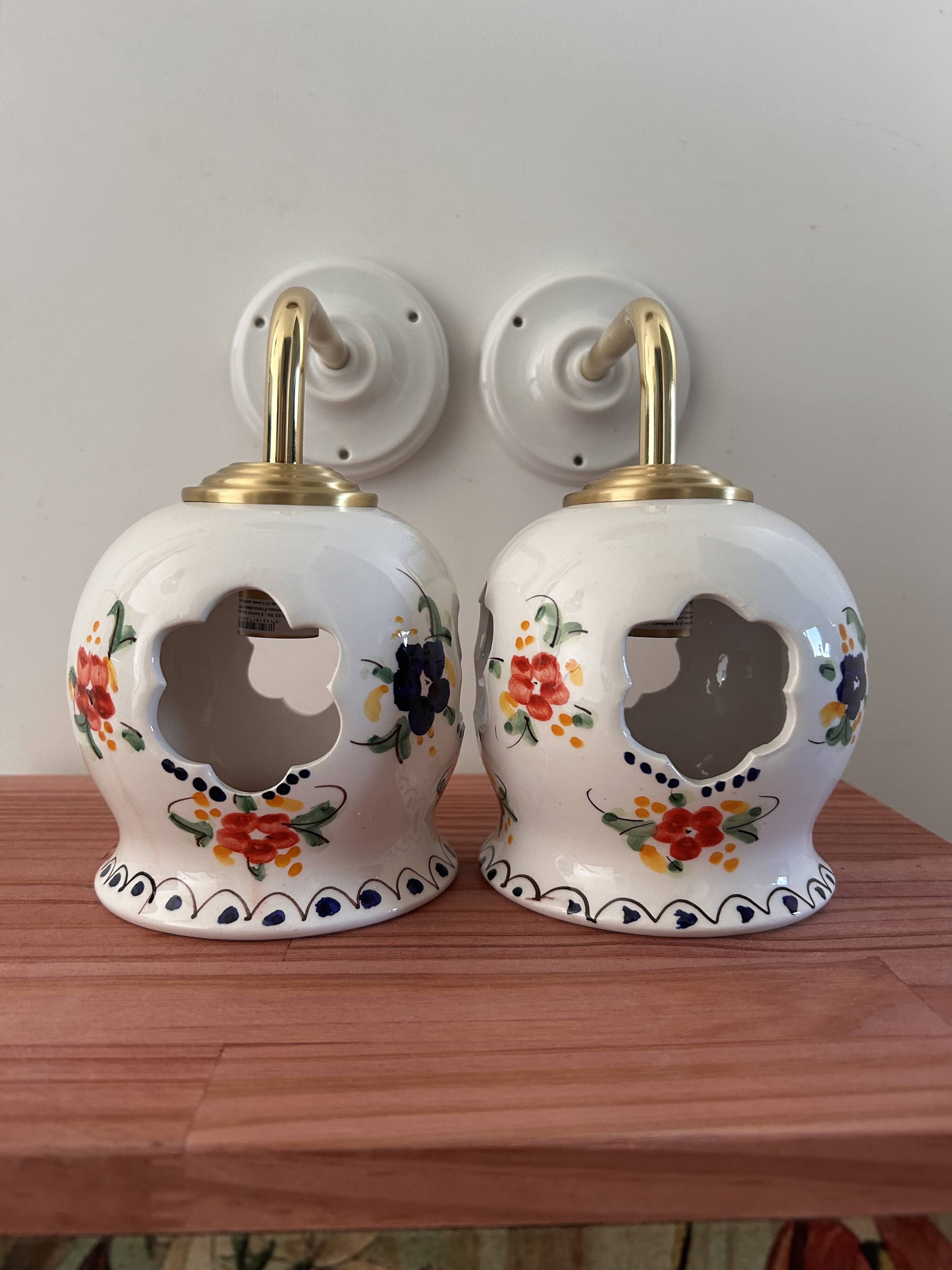 Pair of openwork ceramic wall lights