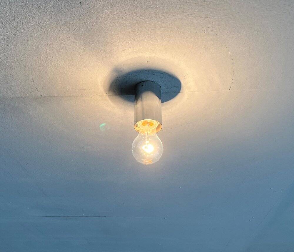 Vintage minimalist wall lamps or ceiling lights from the German space age by Rzb, set of 4.
