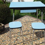 Blue formica table and two stools