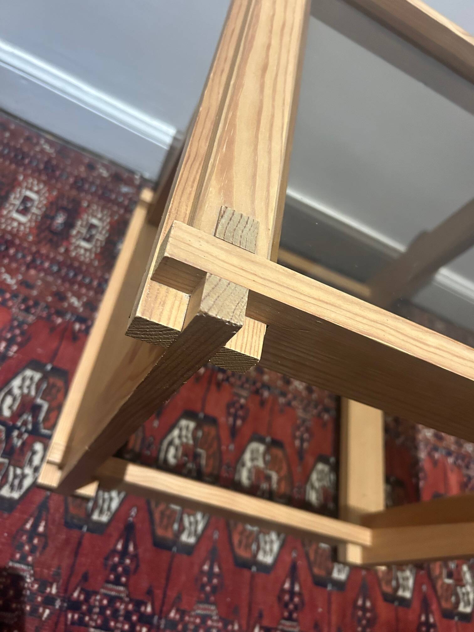 Brutalist table in wood and smoked glass