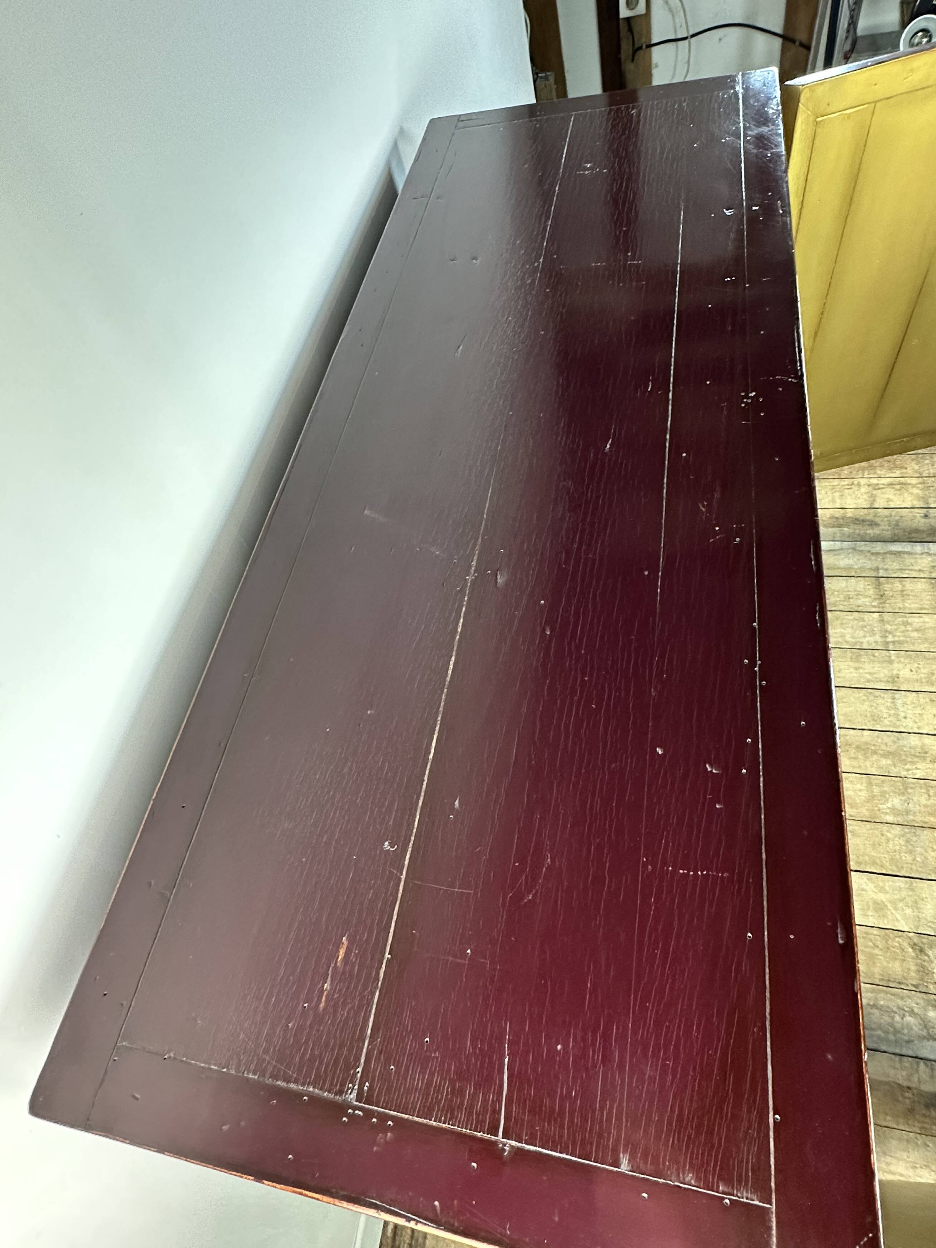 1950's lacquered wood and brass sideboard