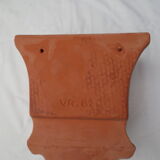 Pair of decorated terracotta wall flower pots