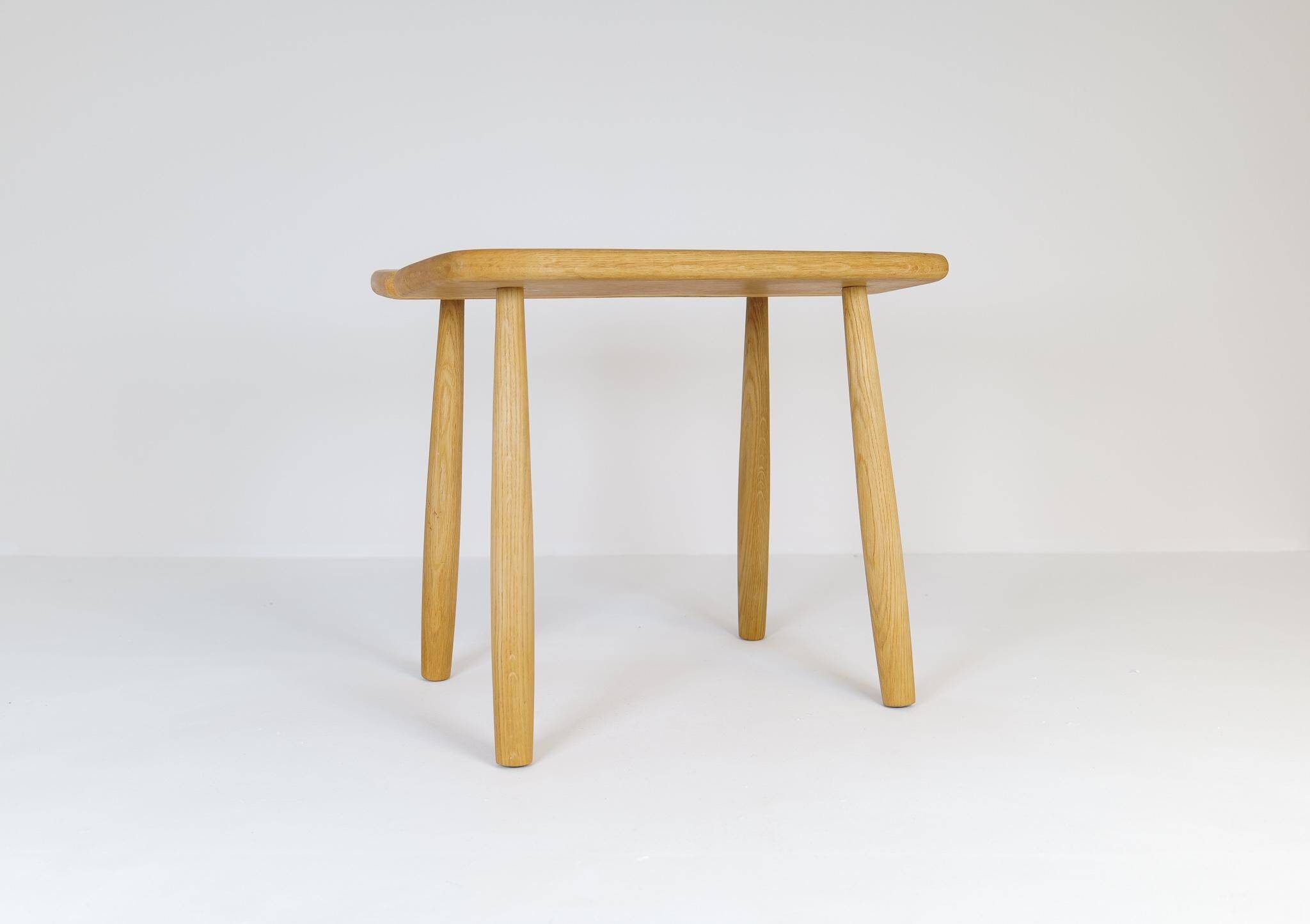 Sculptural mid-century stool in solid oak by Carl Gustaf Boulogner, Sweden, 1950s.