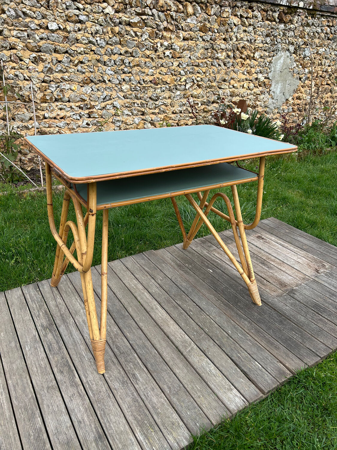 Small vintage rattan desk from the 1960s.