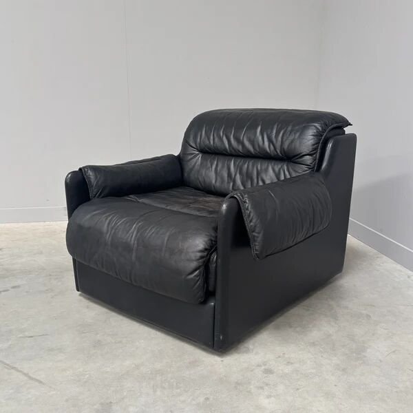 Black leather lounge chair by Dreipunkt, 1970s