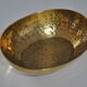 Empty hammered brass pocket