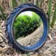Convex mirror, also known as a witch's mirror.