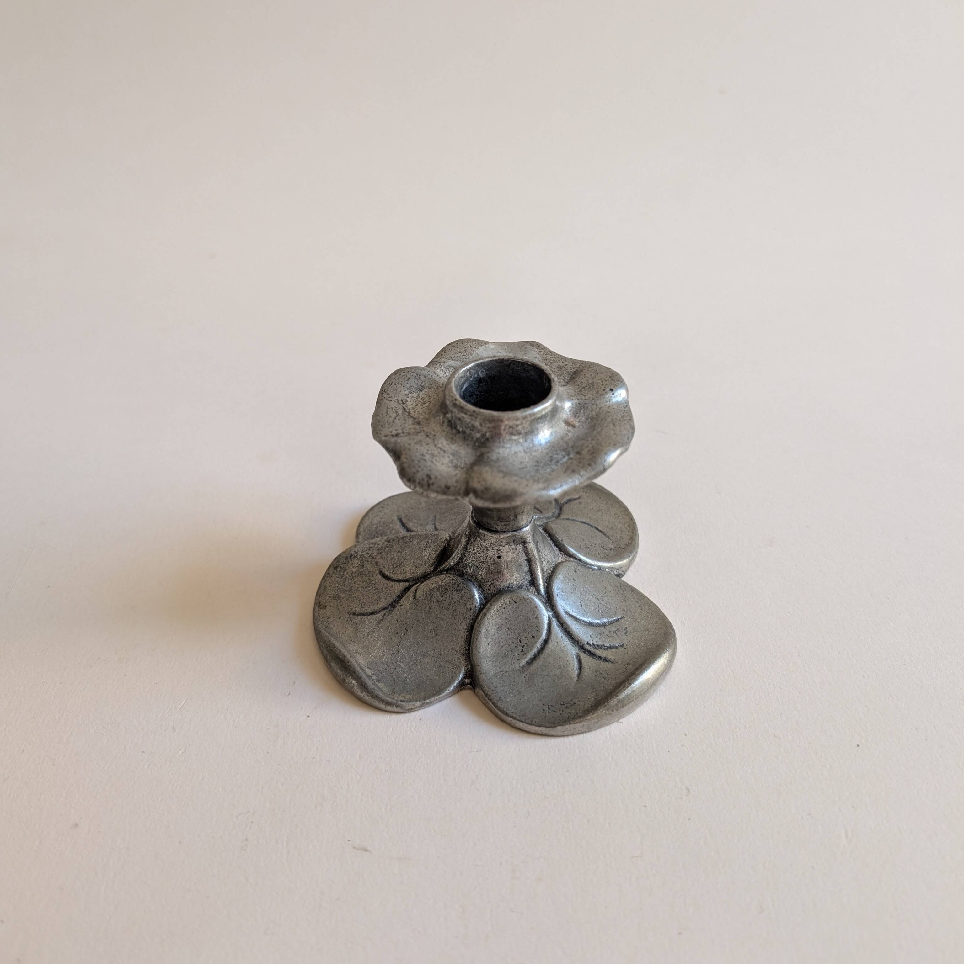 Tin candle holder