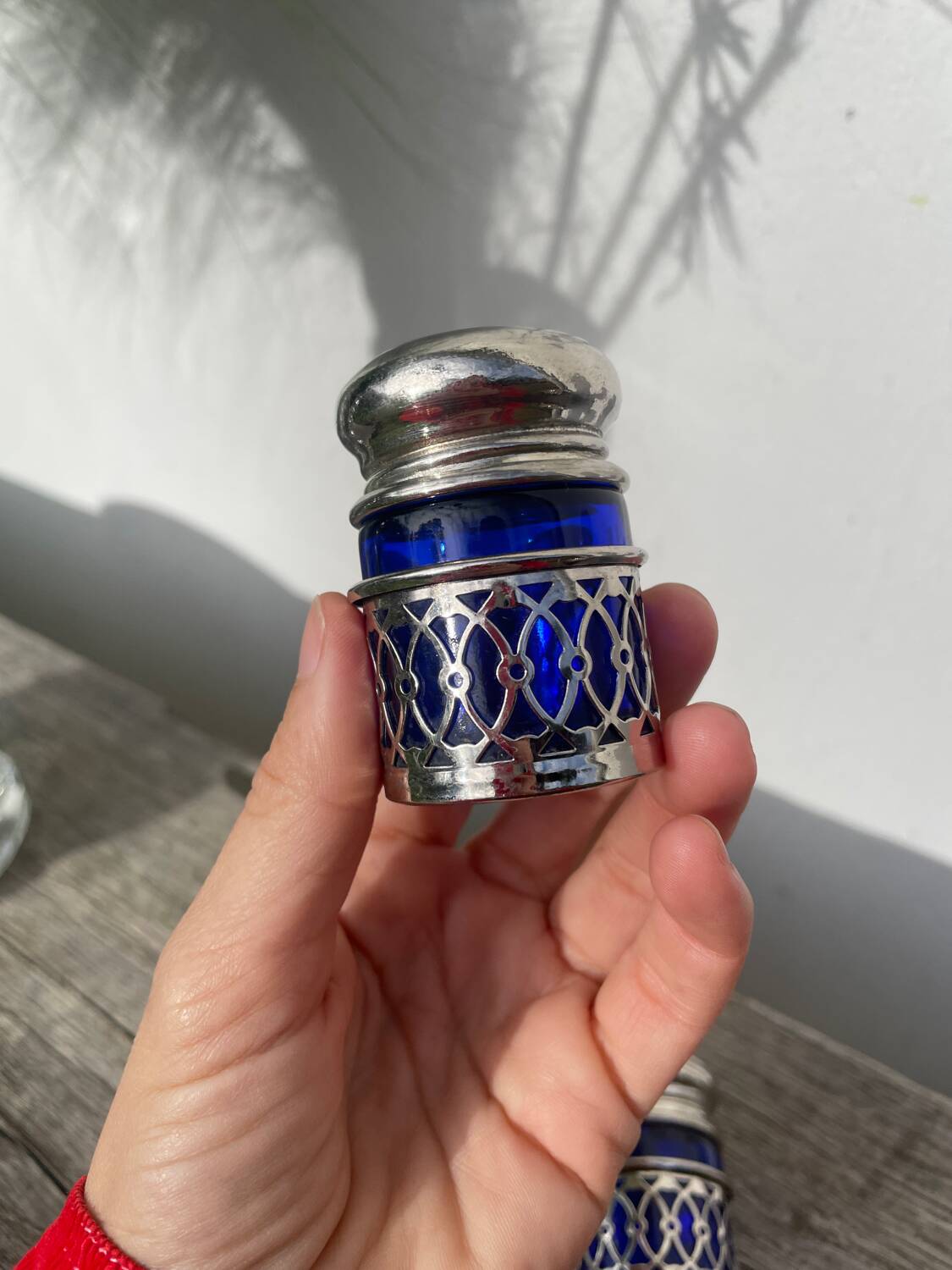 Silver-plated metal and blue glass salt and pepper shaker