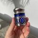 Silver-plated metal and blue glass salt and pepper shaker