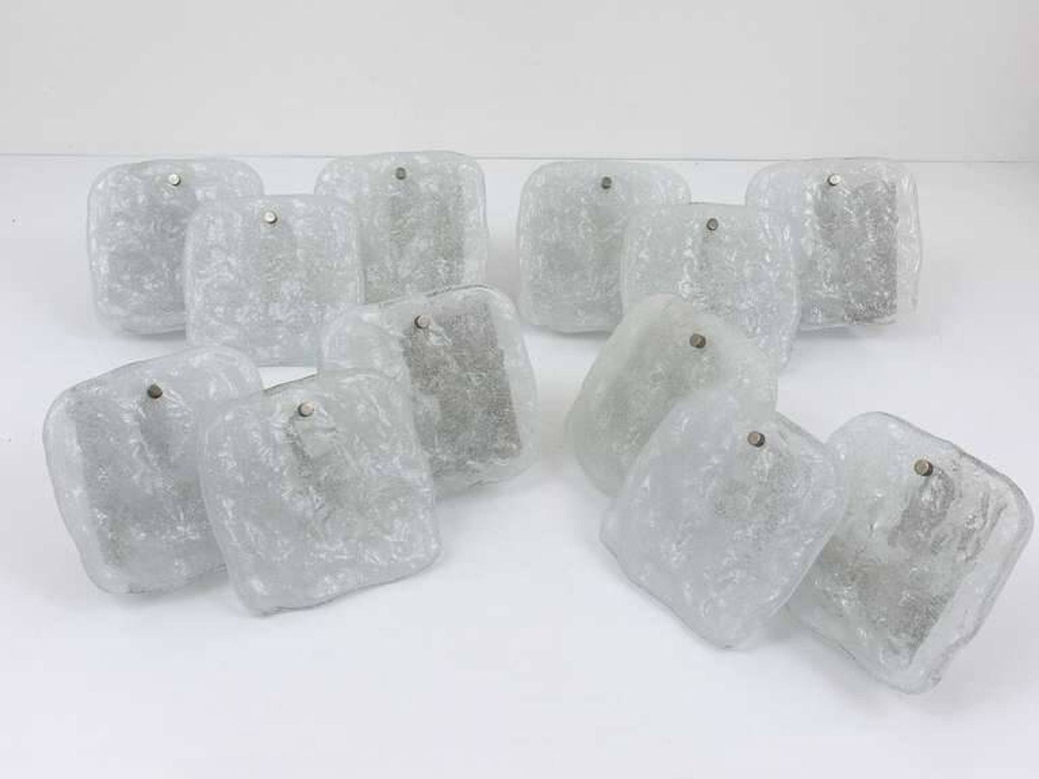 Up to 4 modern wall sconces Kalmar Vienna with frosted glass panels from the 1960s.