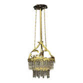 Lustre ancien en bronze doré avec pendeloques en cristal.
