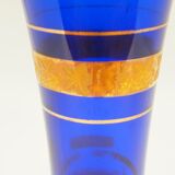 Blue glass decanter with gold decoration