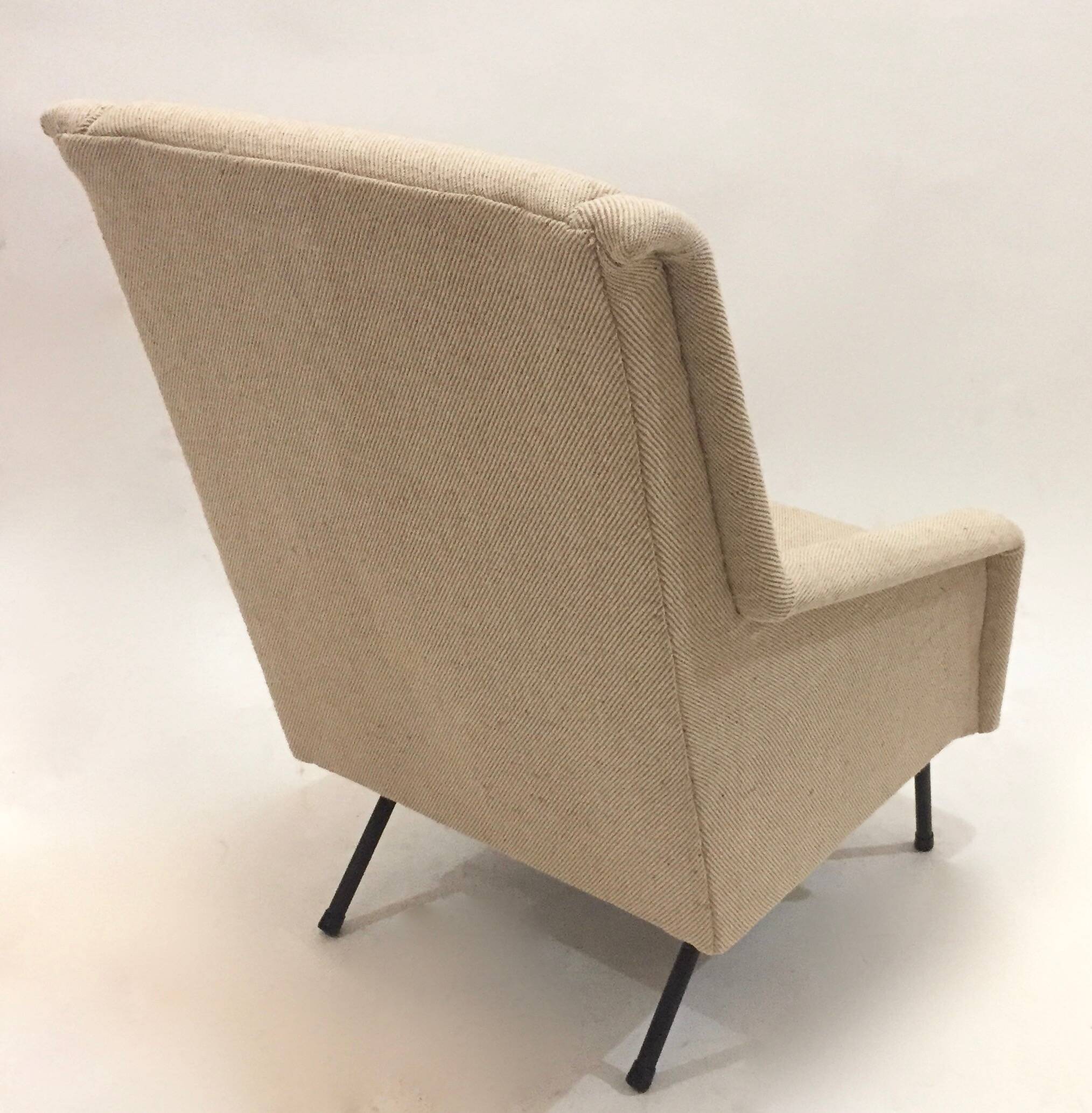 reupholstered modernist armchair