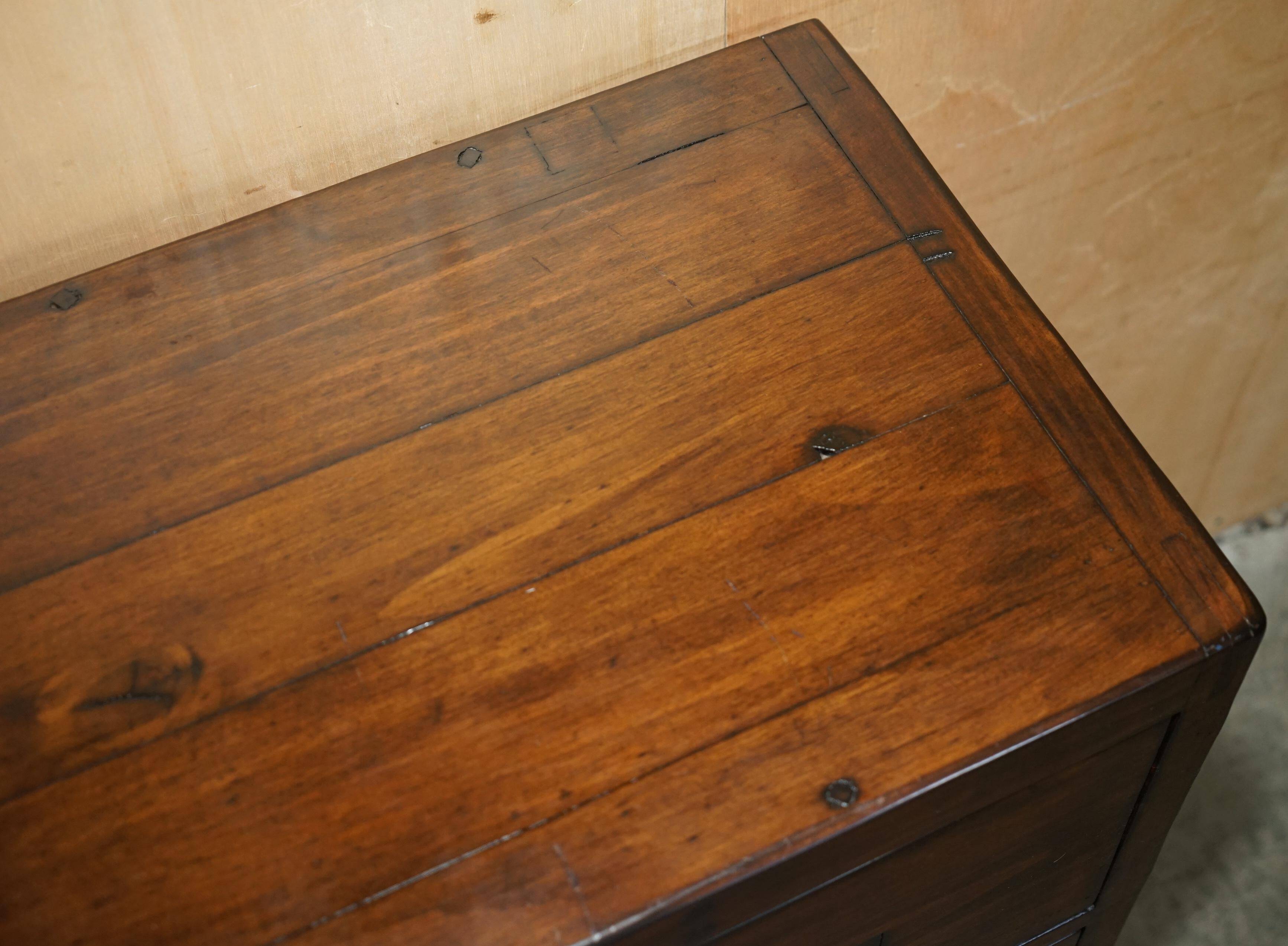 Large vintage hardwood furniture in military country style.