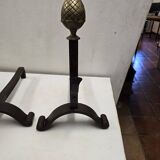 Old pair of wrought iron and bronze andirons
