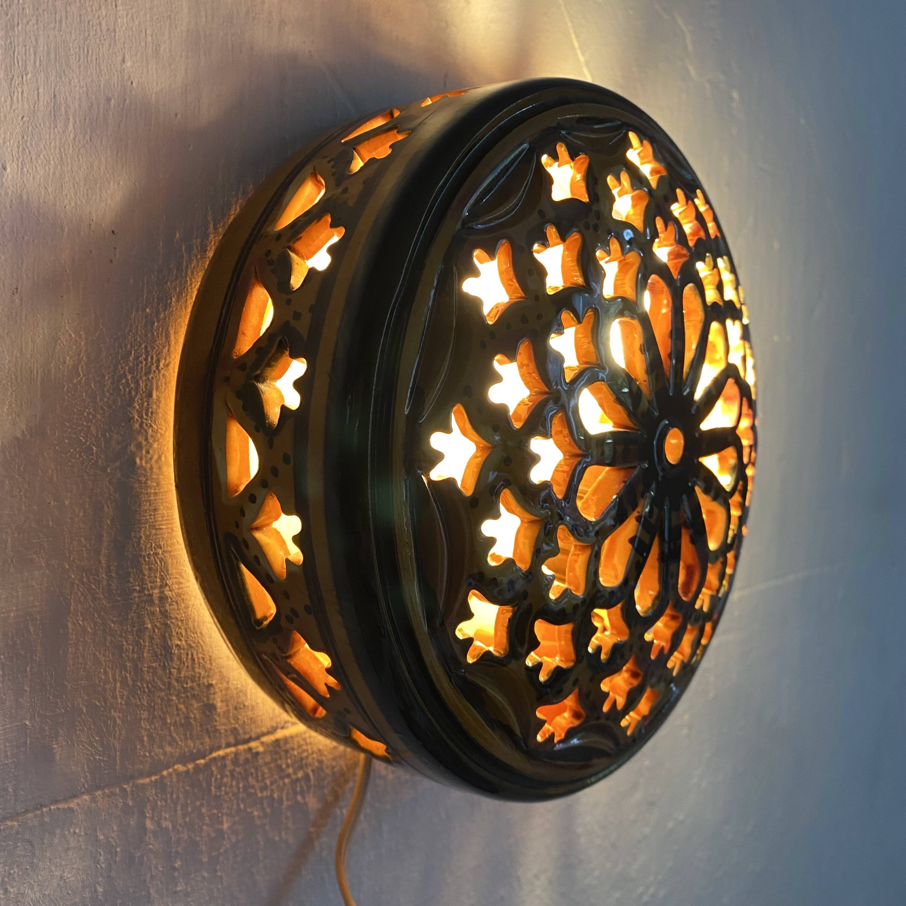 Pair of enamelled terracotta wall lights