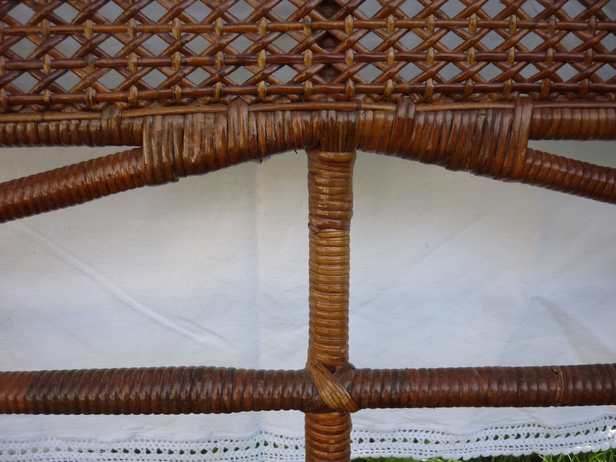 Braided and caning head of bed in wicker and rattan peacock