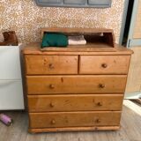 Wooden chest of drawers with changing table