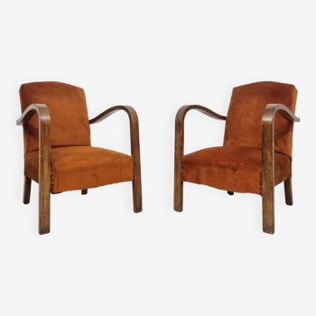 Pair of curved Art Deco armchairs