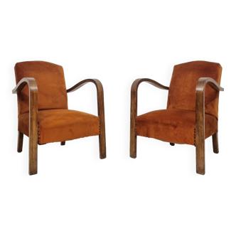 Pair of curved Art Deco armchairs