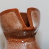 Brown painted earthenware pitcher