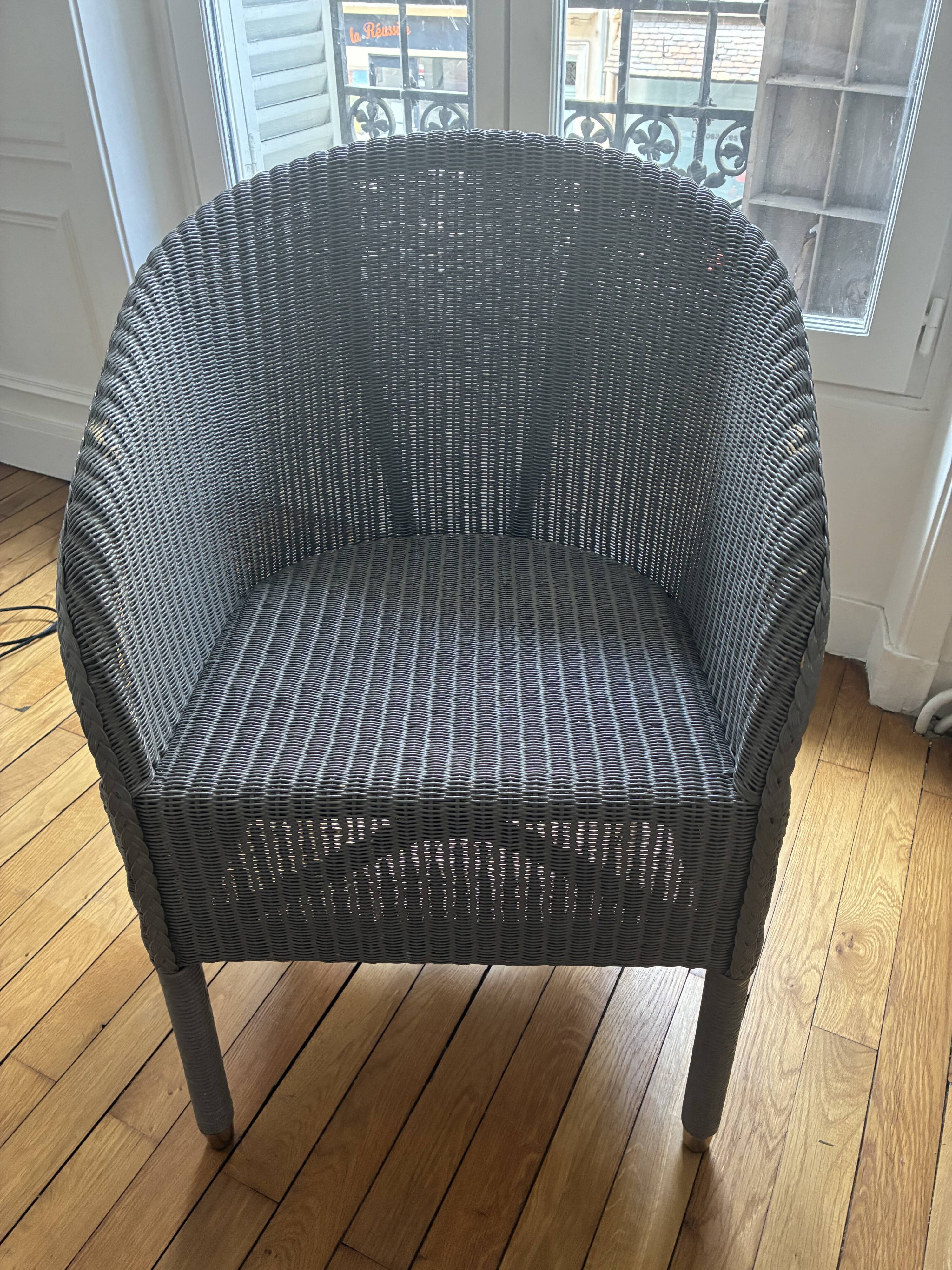 Blue grid rattan armchair