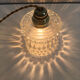Suspension made with a vintage glass globe