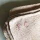 Old hemp harvest tablecloth tinted in pink tea