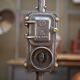 Old gas pump floor lamp in cast iron metal and glass 1930