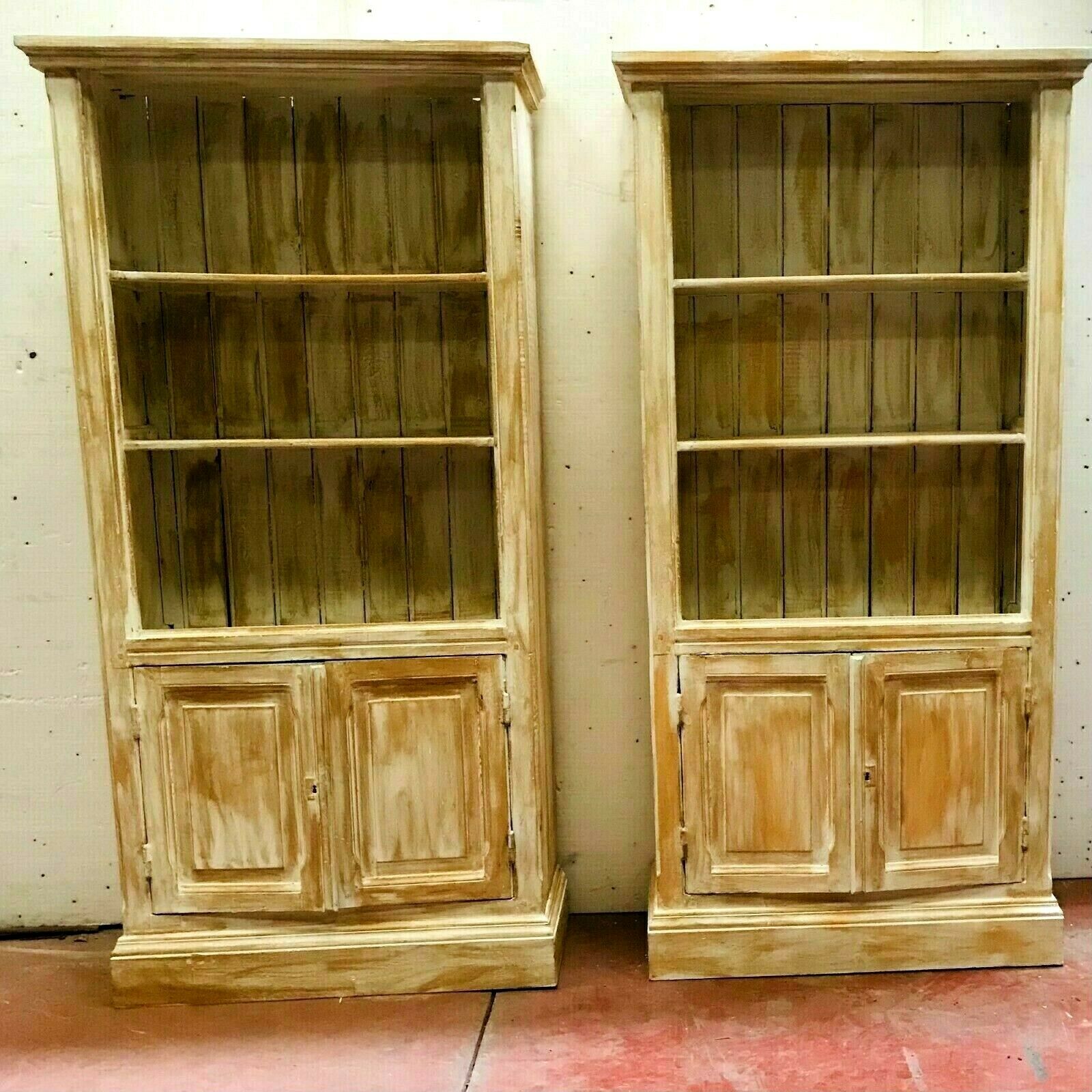 Pair of store windows in patinated fir