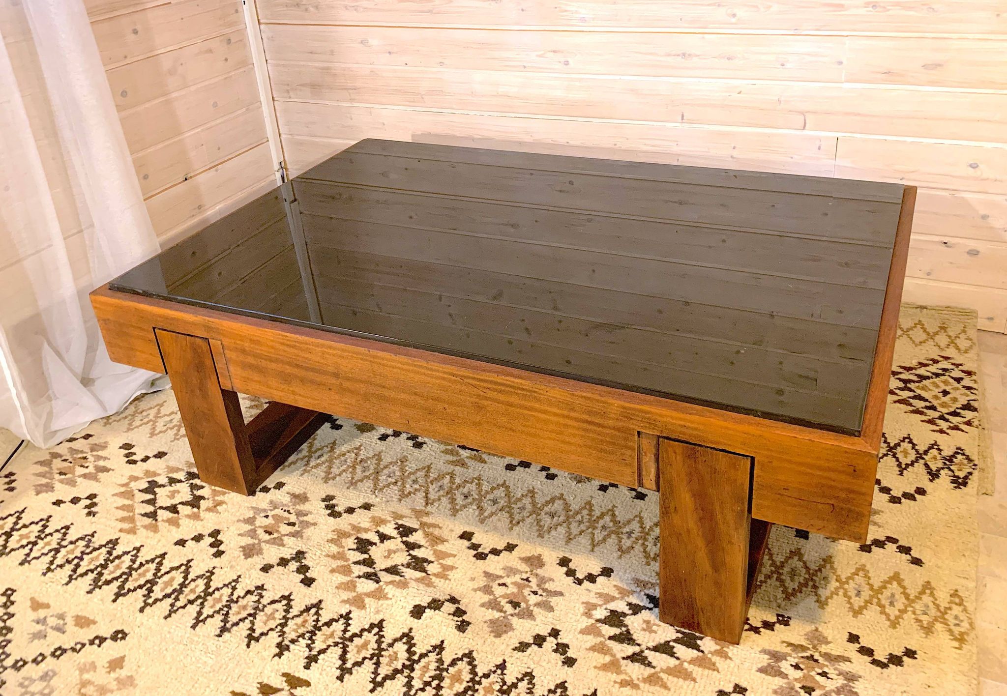 Rosewood coffee table, with black glass top, Brazil 1970