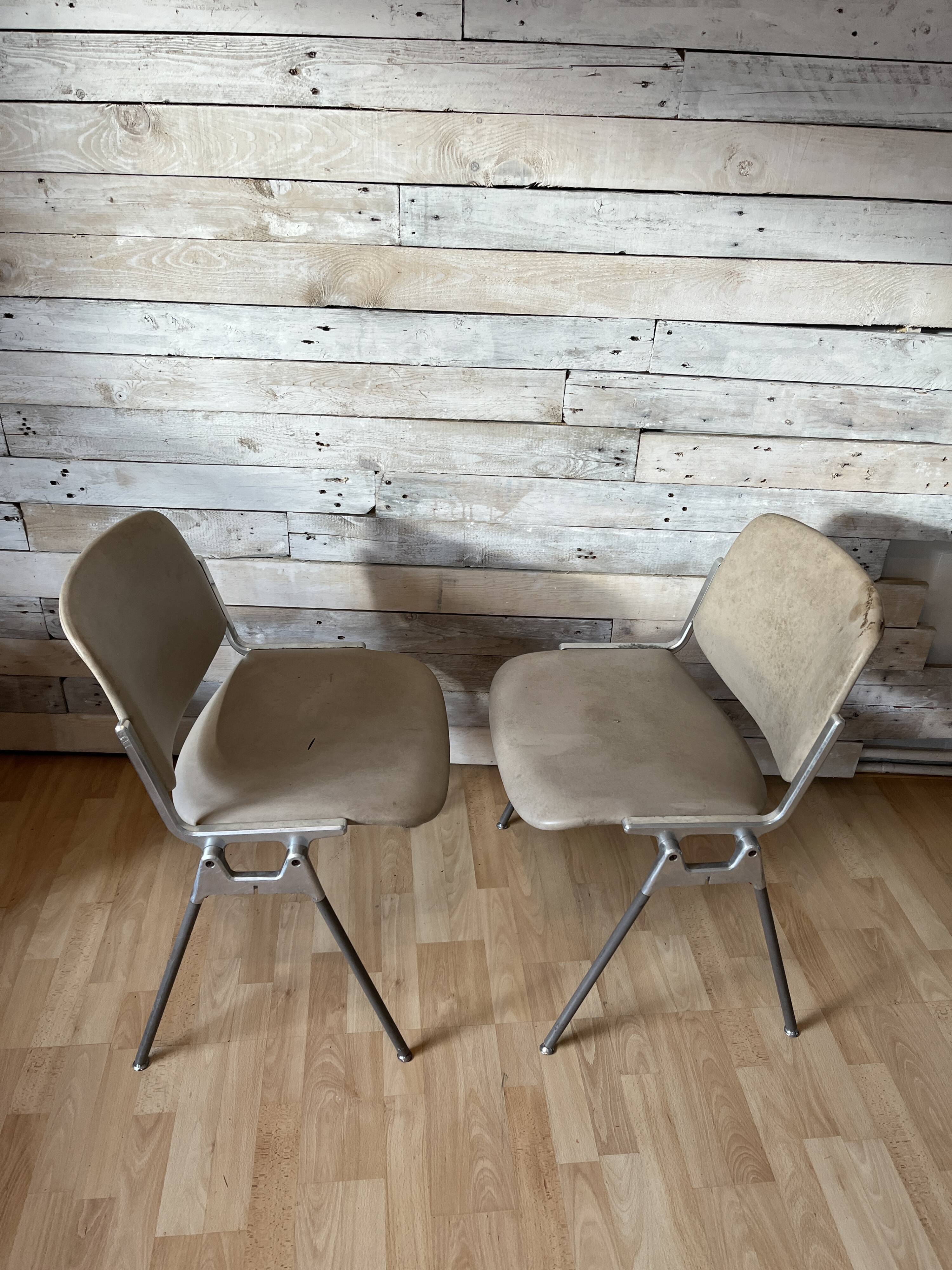 Pair of stackable chairs by Giancarlo Piretti for Castelli