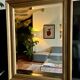 Large antique beveled mirror in the Napoleon III style - Gold and black frame