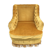 Fauteuil crapaud capitonné ocre