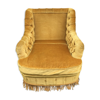 Fauteuil crapaud capitonné ocre