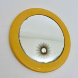Round wall mounted mirror in yellow plastic 1970