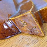 Signed brown enamel mask