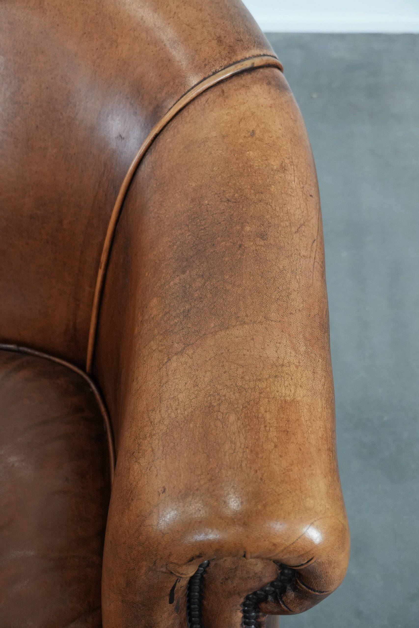 Sheepskin leather club chair with beautiful colours and comfortable seat