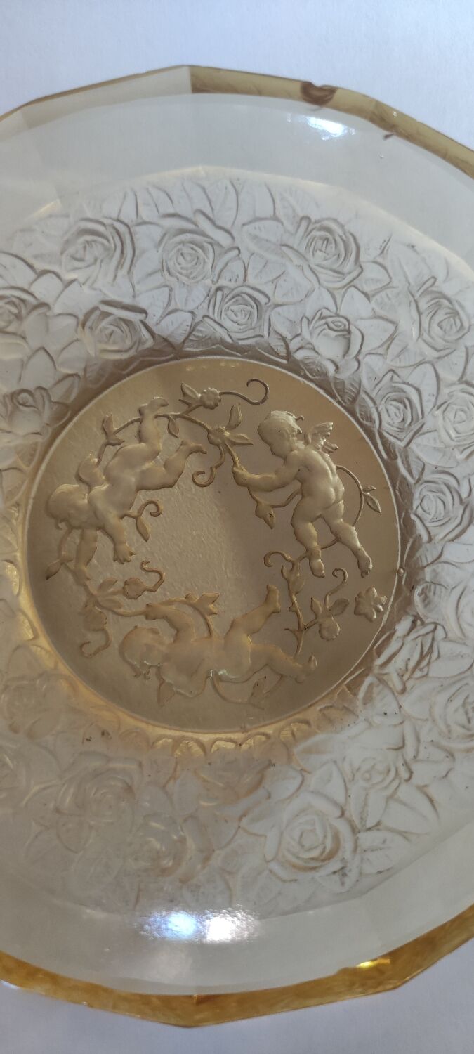 Old empty cup golden yellow glass pocket