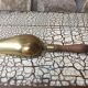 Old brass grocer's shovel or seed