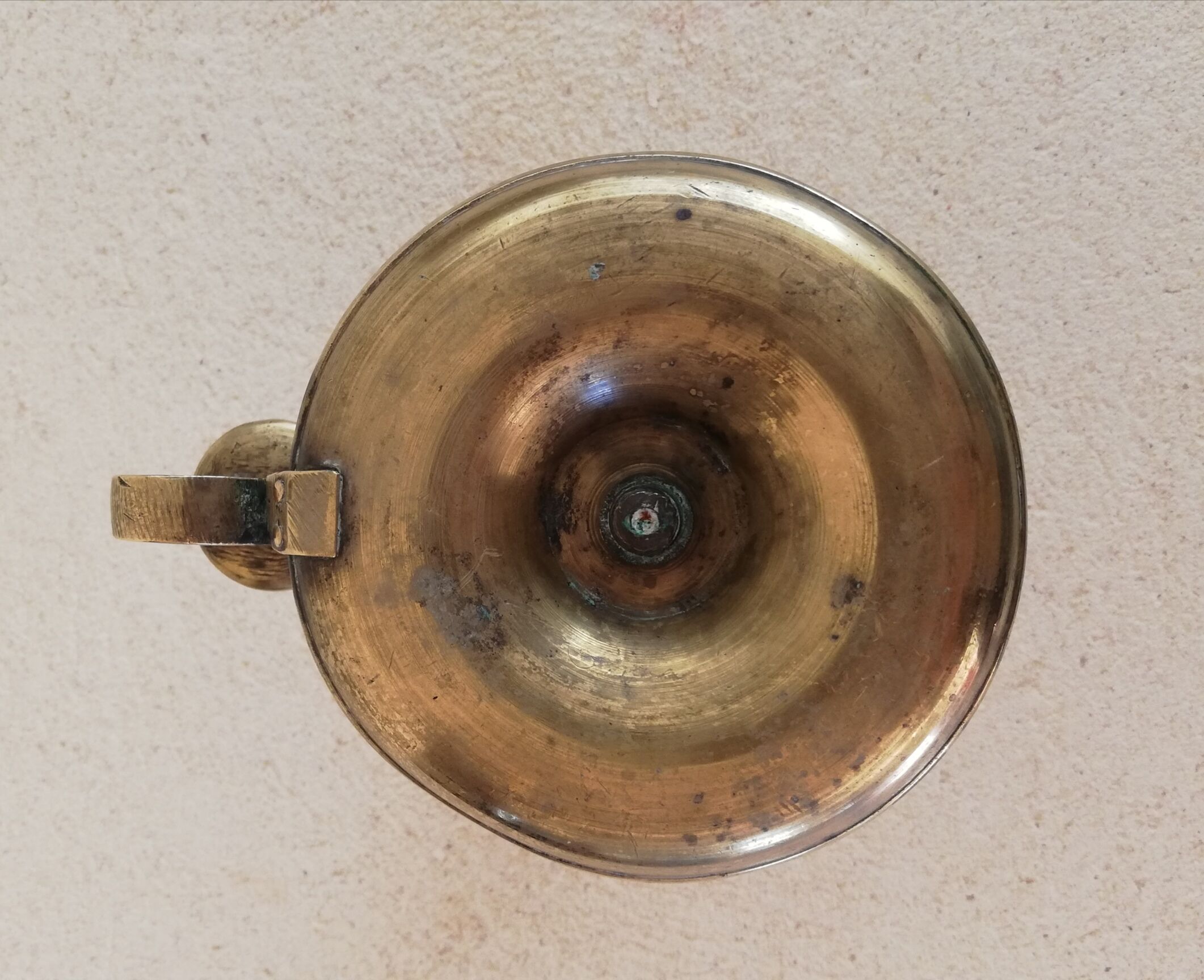 Brass hand candle holder