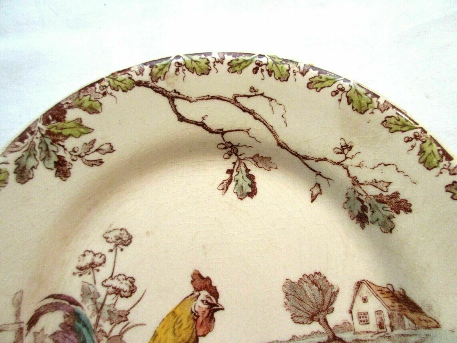 Polychrome plate Iron Earth signed Gien model Coqs