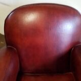 Club armchair with round back