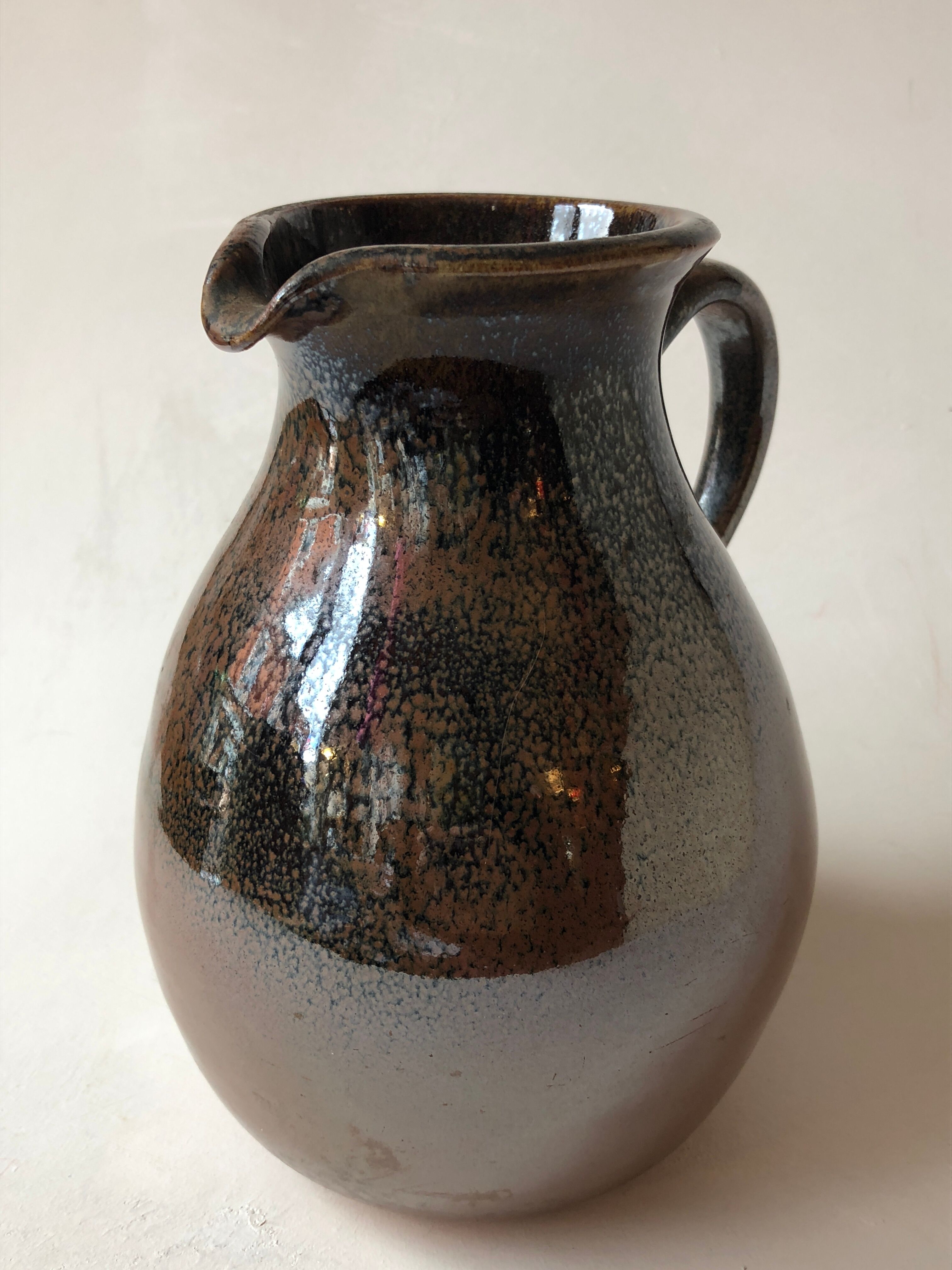 Glazed stoneware jug signed "KD".